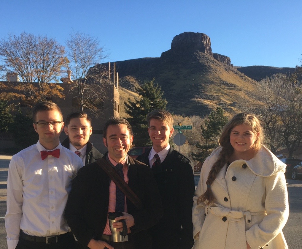 a picture of the 2015 team standing in front of distant mountain peek in Golden, CO
